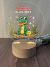 a glass plaque with a picture of a crocodile