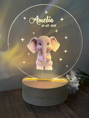 a personalized lamp with an elephant on it