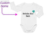 a baby bodysuit with a name and a picture of a shamrock