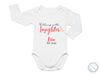 a white bodysuit with the words, congratulations, and a picture of a baby