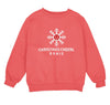 a red sweatshirt with a snowflake design on it