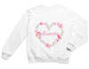 a white sweatshirt with a heart and name on it