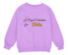 a purple sweatshirt with a crown on it