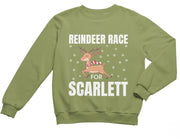 a green sweatshirt with reindeer race for scarlet on it